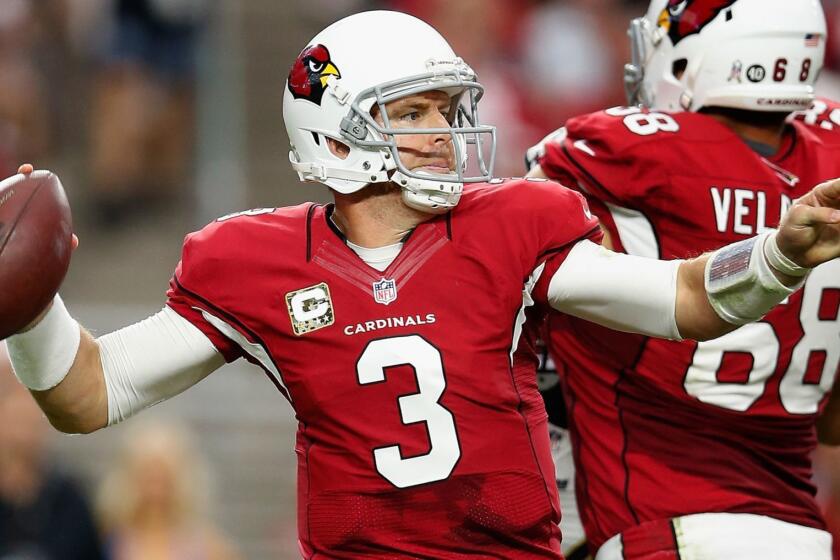 FILE - NOVEMBER 10: According to reports November 10, 2014, Arizona Cardinals quarterback Carson Palmer is out for the rest of the season with a torn ACL in his left knee. GLENDALE, AZ - NOVEMBER 09: Quarterback Carson Palmer #3 of the Arizona Cardinals throws the football in the second quarter of the NFL game against the St. Louis Rams at the University of Phoenix Stadium on November 9, 2014 in Glendale, Arizona. (Photo by Christian Petersen/Getty Images) ORG XMIT: 507826143