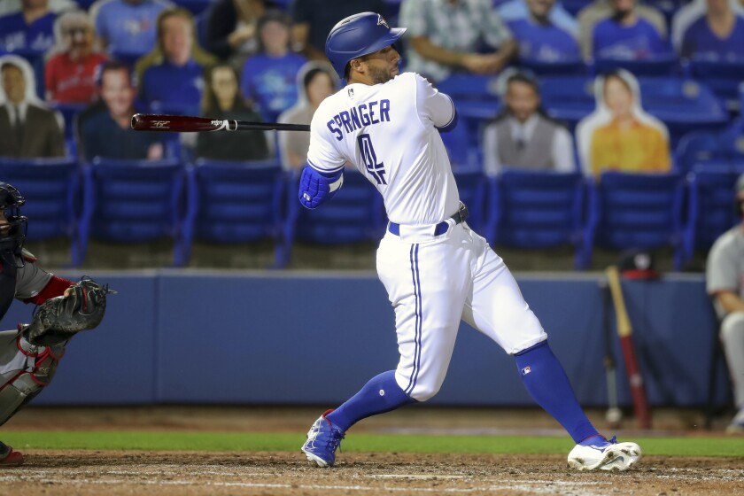 Toronto Blue Jays; George Springer lines out against the Washington Nationals during the fifth inning of a baseball game Wednesday, April 28, 2021, in Dunedin, Fla. (AP Photo/Mike Carlson)