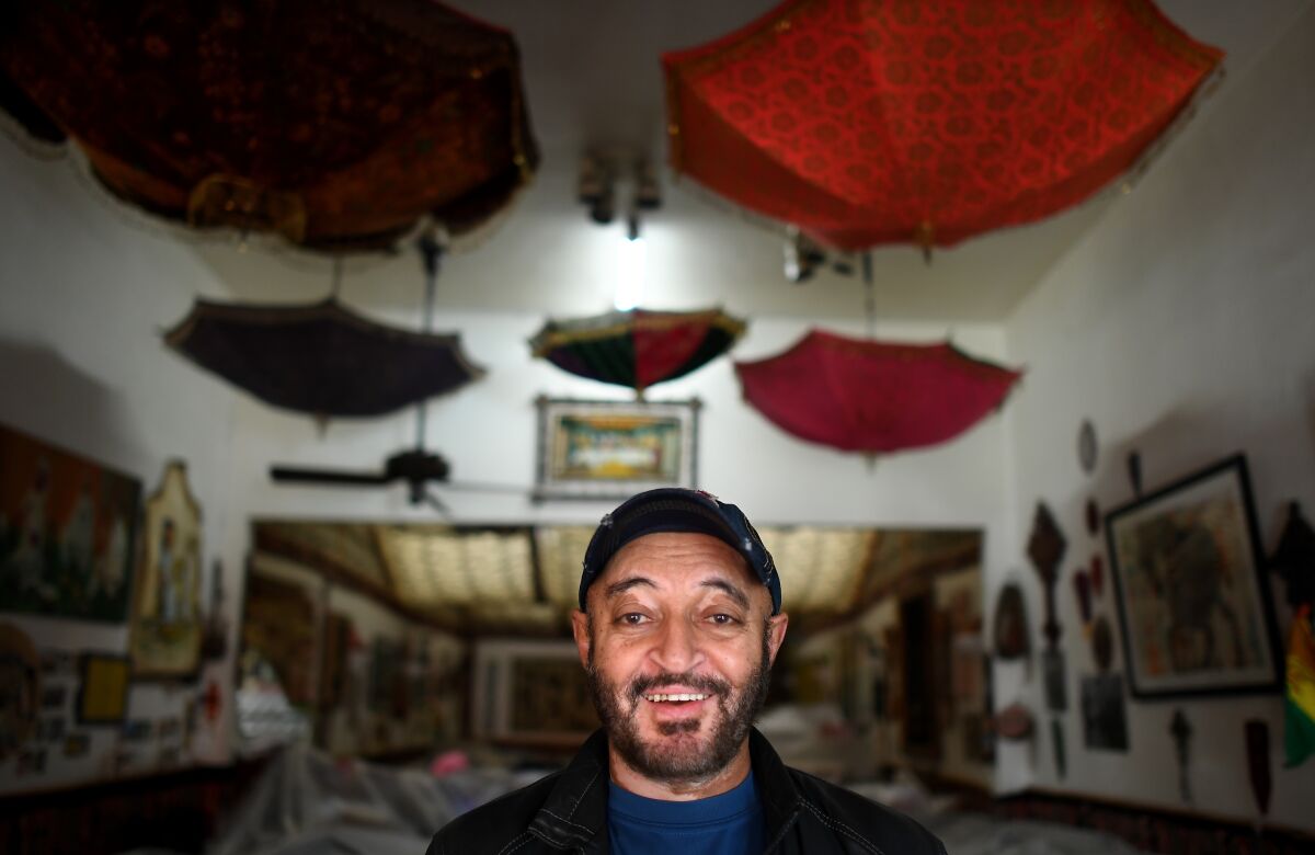 Dawit Belay stands in his restaurant Merkato in the Little Ethiopia area of Los Angeles. 