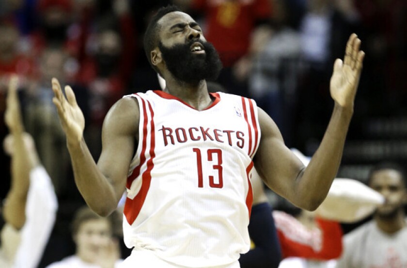Houston Rockets guard James Harden reacts after hitting a three-point shot against the Indiana Pacers in March. The Lakers host the Rockets on Tuesday.