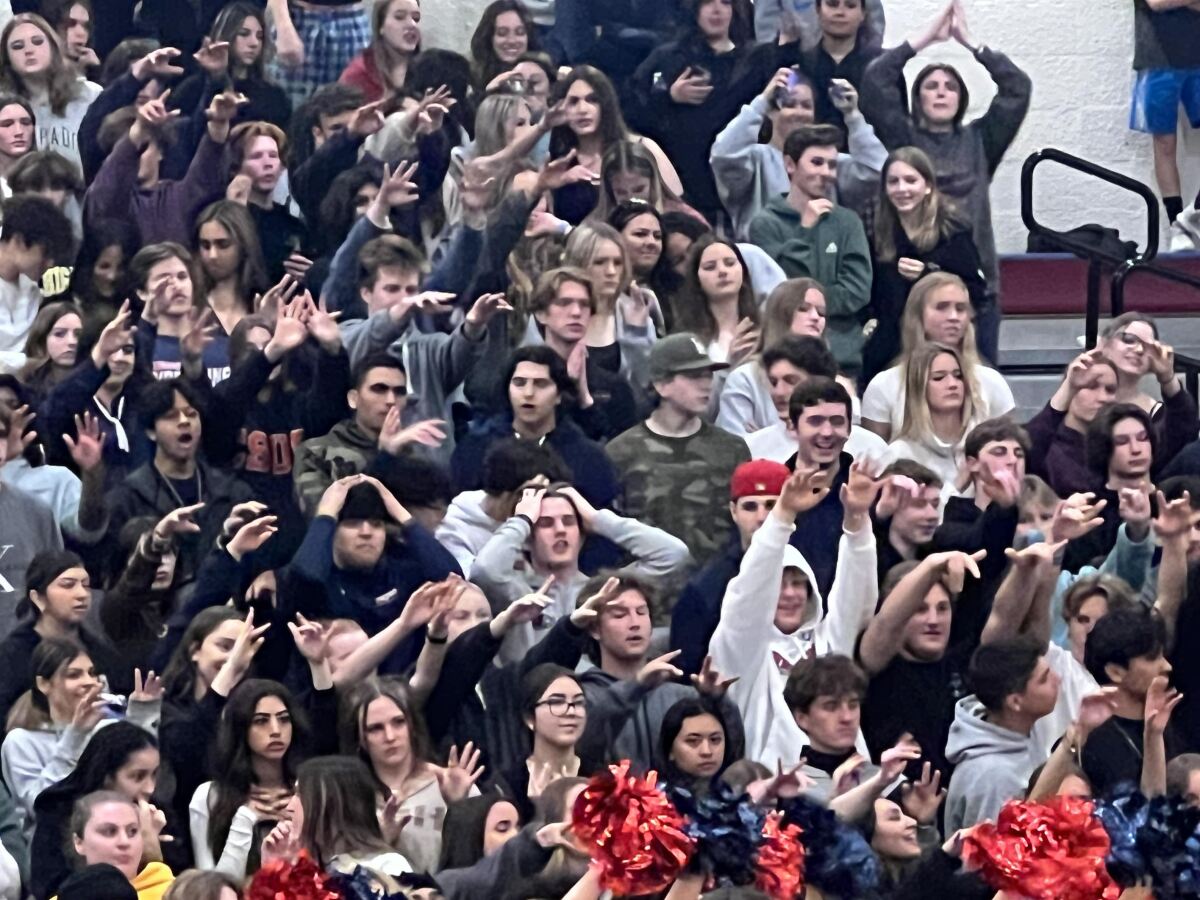 Tesoro fans support their neighborhood classmates in 50-47 Division II win over San Gabriel Academy.