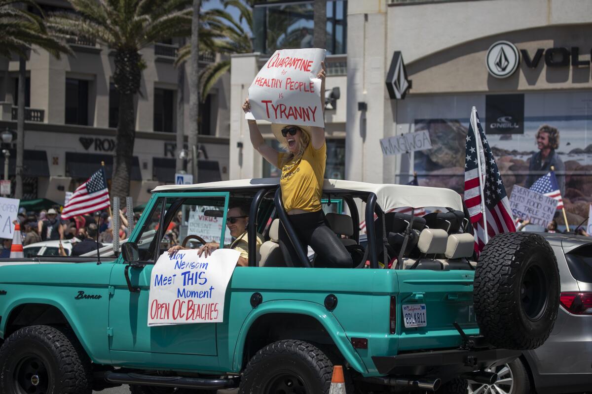 Motorists join protesters in Huntington Beach