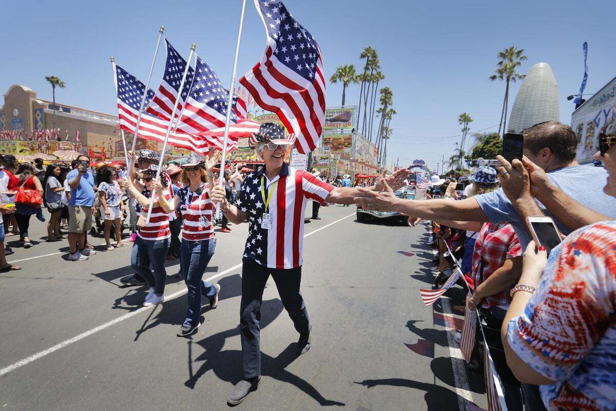 The 4th of July Hometown Heroes Parade makes its way along the midway last year on the final day of the 2018 San Diego County Fair.