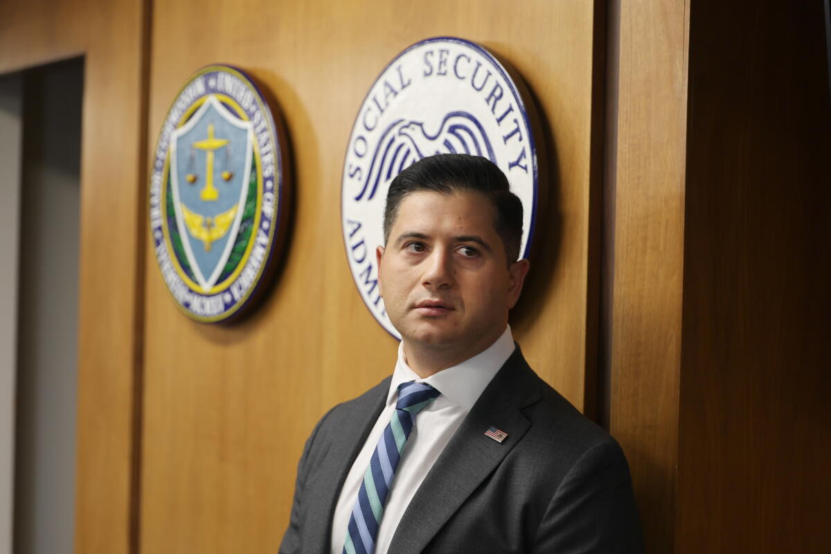 Bilal A. "Bill" Essayli, the First Assistant U.S. Attorney for the Central District of California, exits the room after speaking during a news conference