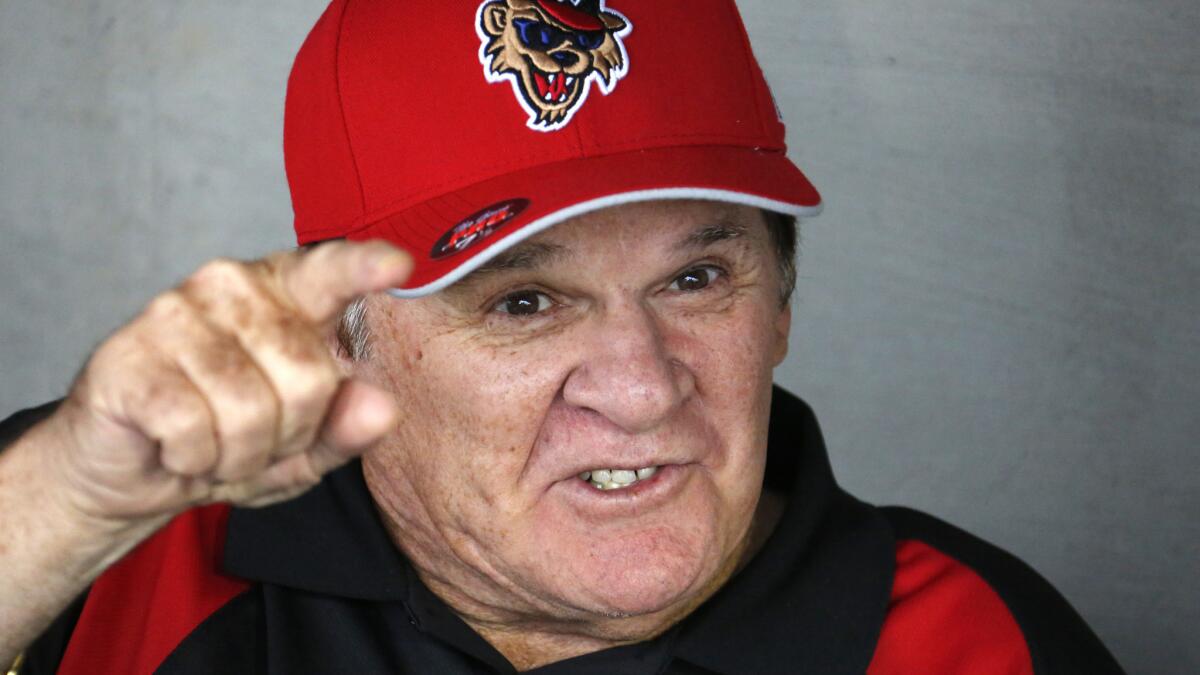Cincinnati Reds great Pete Rose speaks in the dugout during visit to the Washington Wild Things independent minor league team in Washington, Pa., on June 30. Rose will take part in a pregame event at the MLB All-Star Game in Cincinnati on Tuesday.