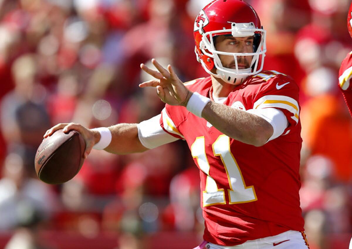 Chiefs quarterback Alex Smith sets up for a pass against the Raiders last week.