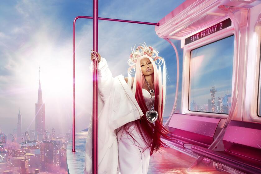 Nicki Minaj, with hot pink hair and white outfit, on imaginary pink subway in the sky
