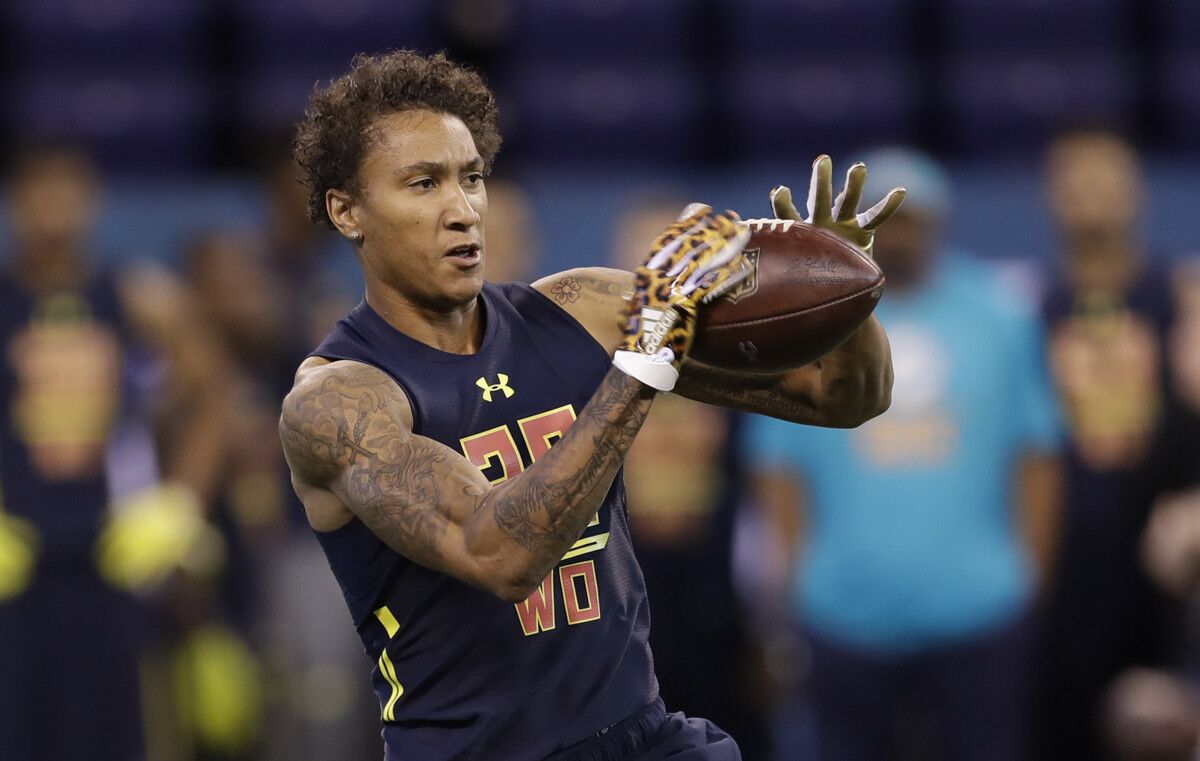 Texas A&M wide receiver Josh Reynolds makes a catch during a drill at the NFL combine in March.