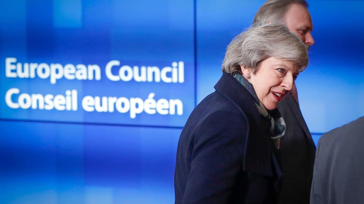 British Prime Minister Theresa May arrives for a meeting at the European Council in Brussels.