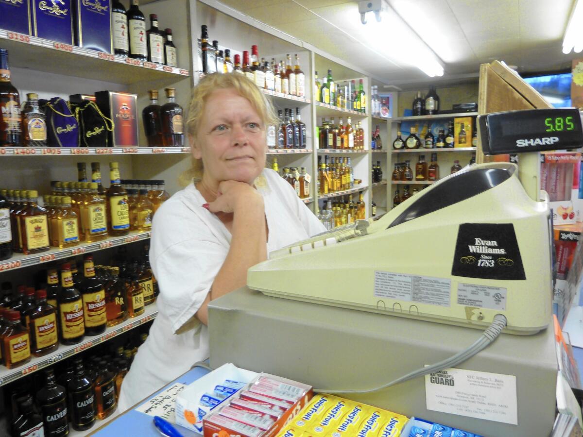 Mary Jackson of 67 Liquor in Possum Grape, Ark., fears new competition if local alcohol bans are lifted.