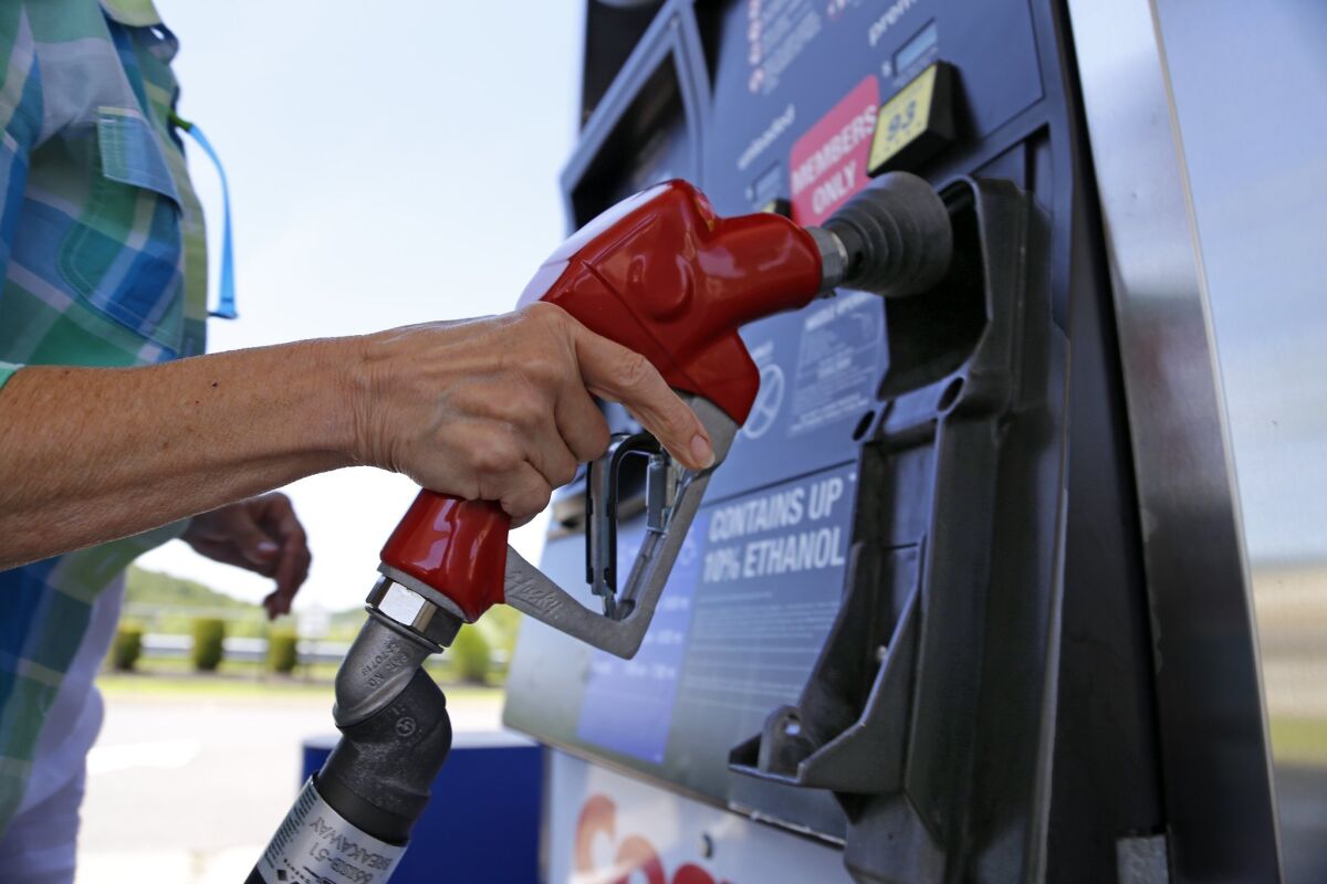 Americans are paying 88 cents less for a gallon of gasoline than they were a year ago, largely because of decling crude oil prices and higher U.S. refinery production. For Californians, and Los Angeles area consumers in particular, the difference is much smaller, about 31 cents a gallon compared to a year ago, according to GasBuddy.com