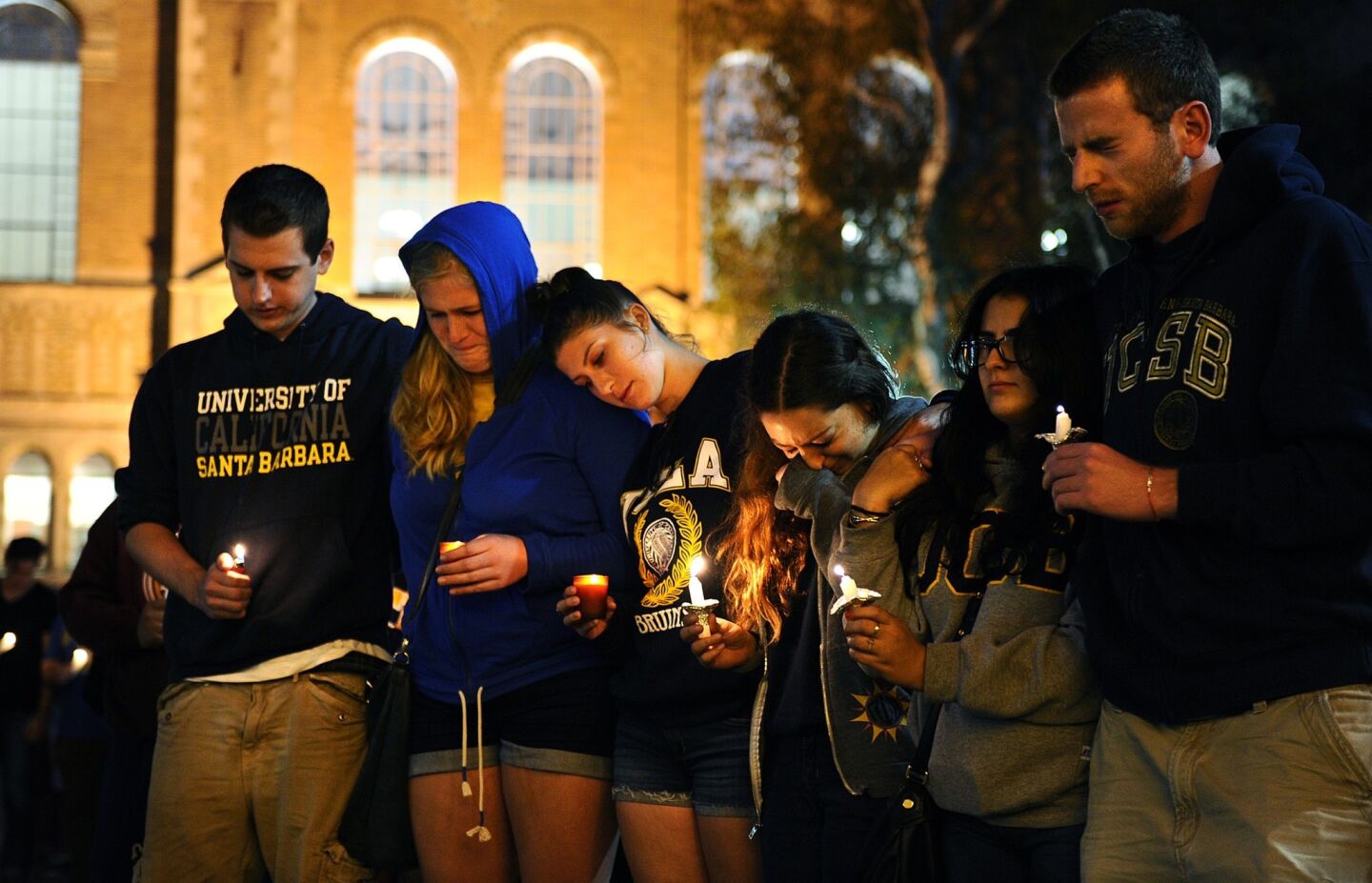 Students gather near Royce Hall at UCLA to pay tribute to the Isla Vista victims during a candlelight vigil Monday.