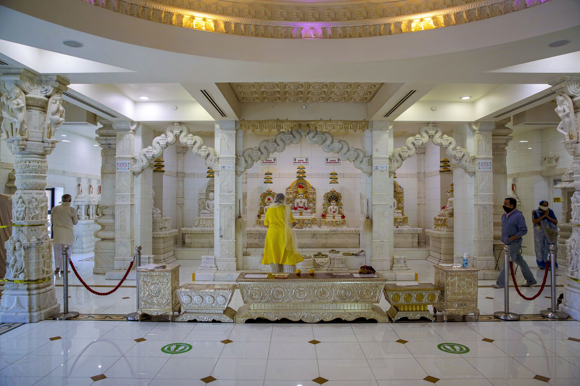 People offer prayers at Jain Center of Southern California.