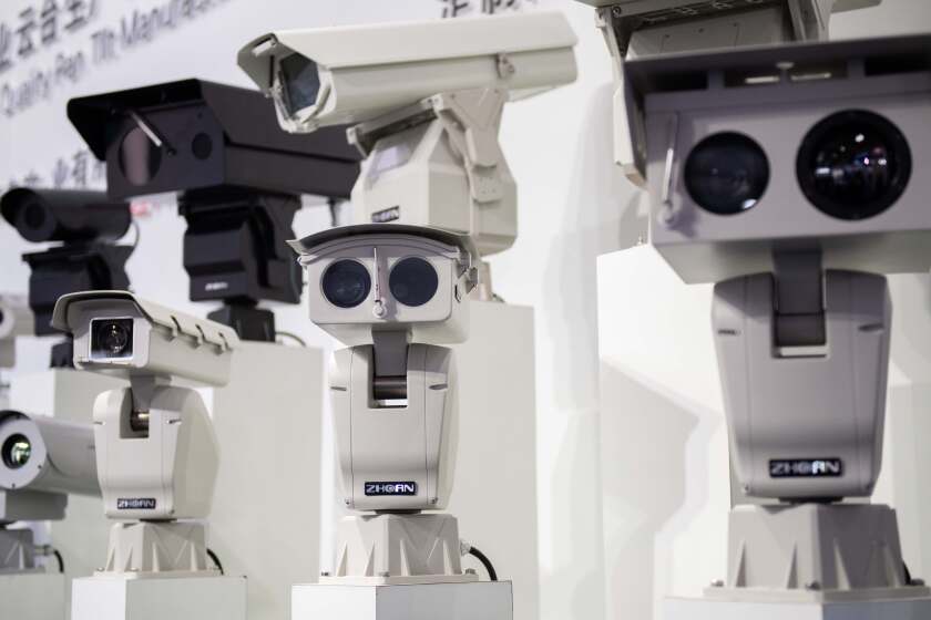 AI (Artificial Inteligence) security cameras using facial recognition technology are displayed at the 14th China International Exhibition on Public Safety and Security at the China International Exhibition Center in Beijing on October 24, 2018. (Photo by NICOLAS ASFOURI / AFP) (Photo credit should read NICOLAS ASFOURI/AFP via Getty Images)