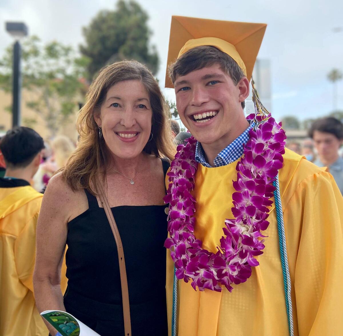 Julie Holdaway is pictured with her son Jonas at this year’s Edison High School graduation.