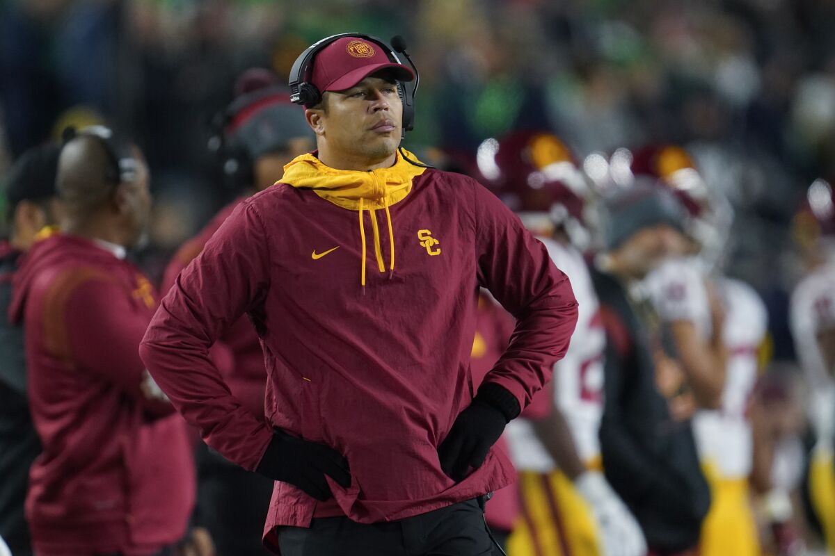 USC interim coach Donte Williams watches his team play Notre Dame