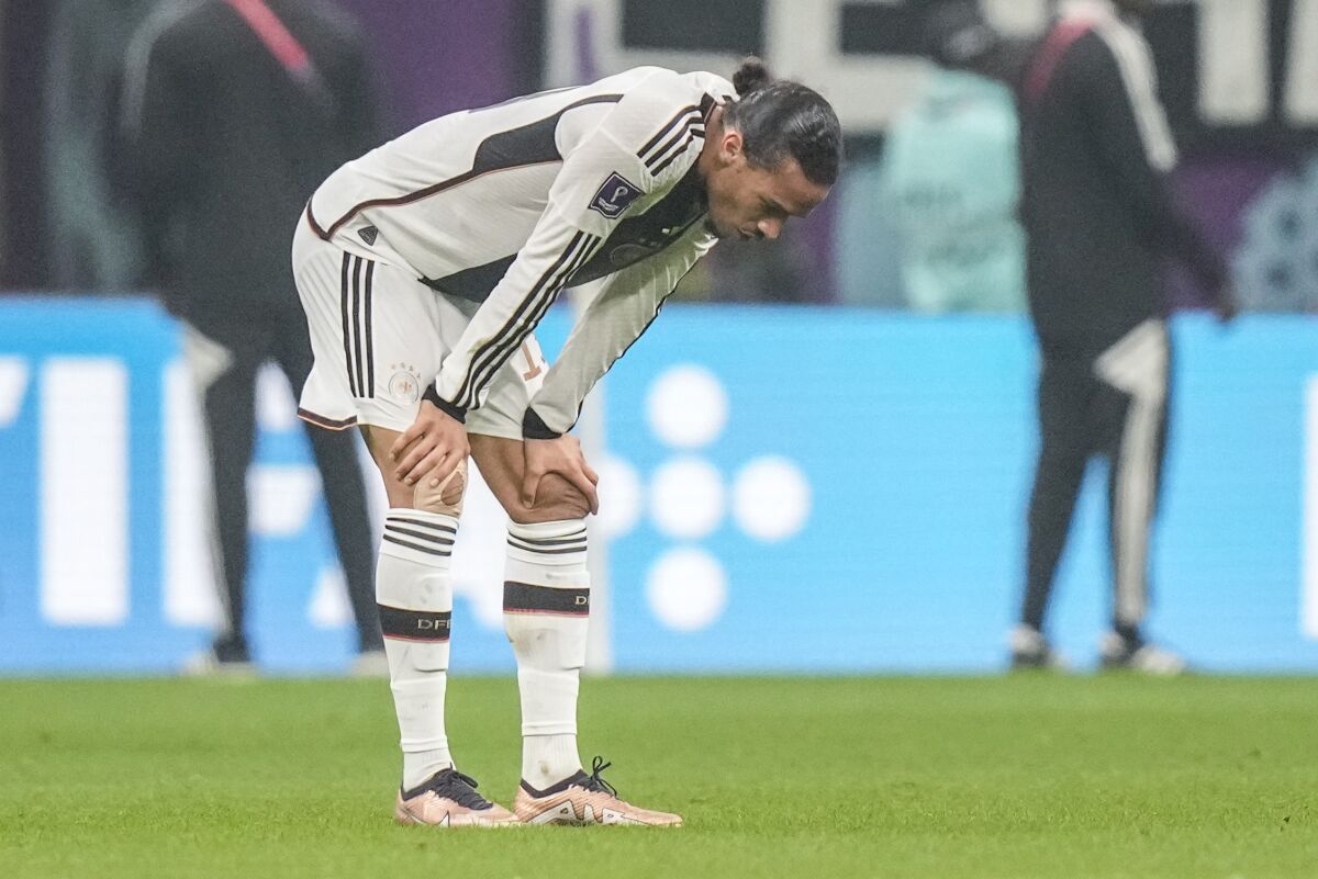 Germany's Leroy Sane reacts at the end of the World Cup group E soccer match between Costa Rica and Germany at the Al Bayt Stadium in Al Khor, Qatar, Thursday, Dec. 1, 2022. (AP Photo/Matthias Schrader)