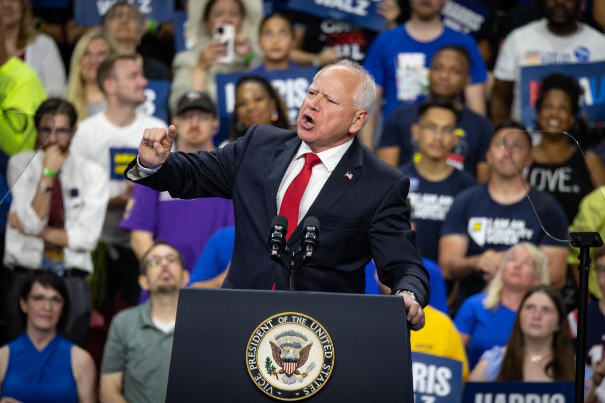 Minnesota Gov. Tim Walz speaks at a rally in Las Vegas.