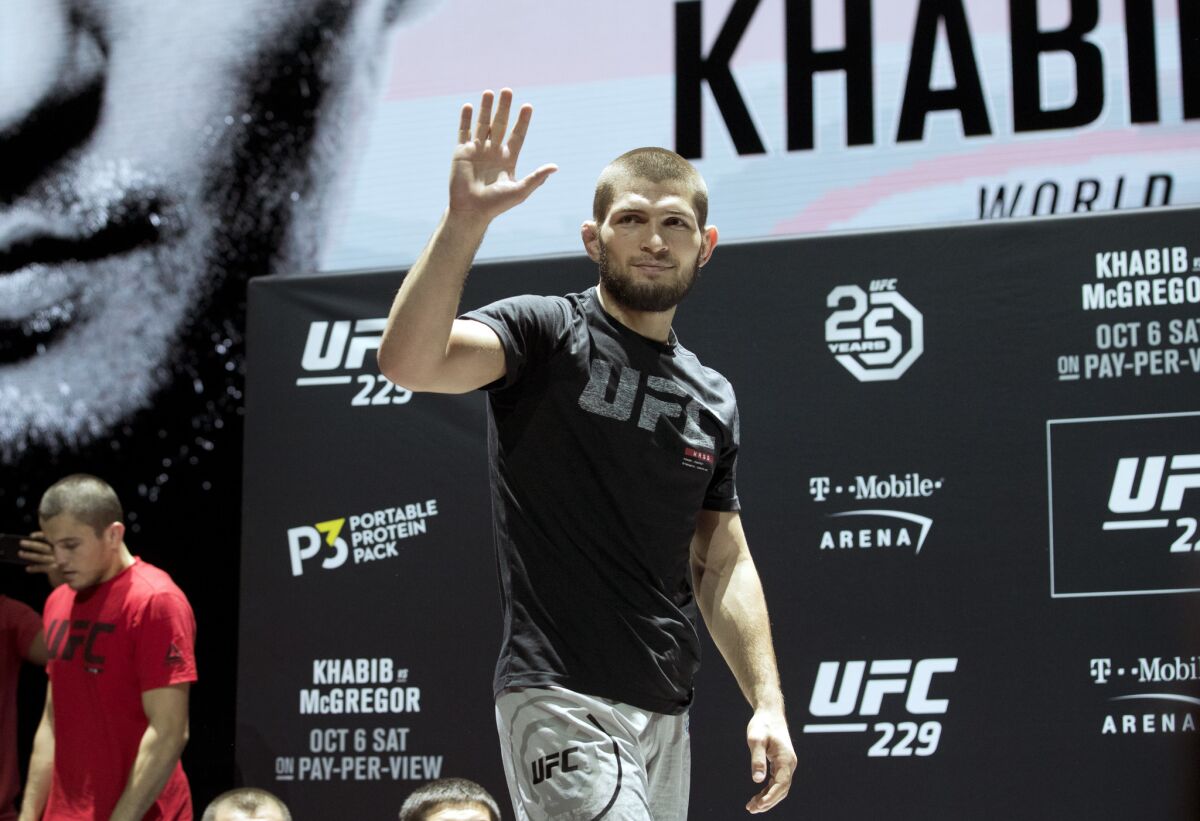 UFC lightweight champion Khabib Nurmagomedov acknowledges the audience during an open training session Wednesday in Las Vegas.
