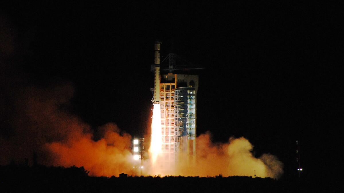 China's quantum satellite, nicknamed Micius after an ancient Chinese scientist, blasts off from Gansu province last August. (STR / AFP/Getty Images)