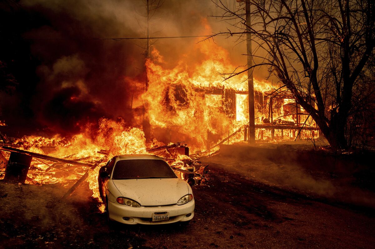latest news Majority of Californians fear worsening weather fluctuations 2 The flames consume a house and a vehicle.