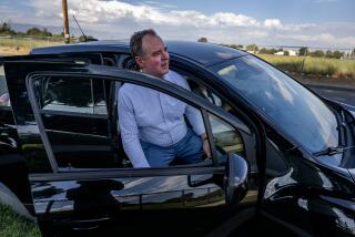 BLOOMINGTON, CA - AUGUST 15, 2023: Congressman Adam Schiff (D-Calif) gets into a car with community activists to tour encroaching warehouses in the Bloomington area of the Inland Empire on August 15, 2023. Schiff is running for the Senate.(Gina Ferazzi / Los Angeles Times)