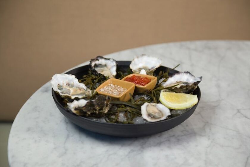 Oysters are in abundance at Charles and Dinorah restaurant at The Pearl Hotel in Point Loma.