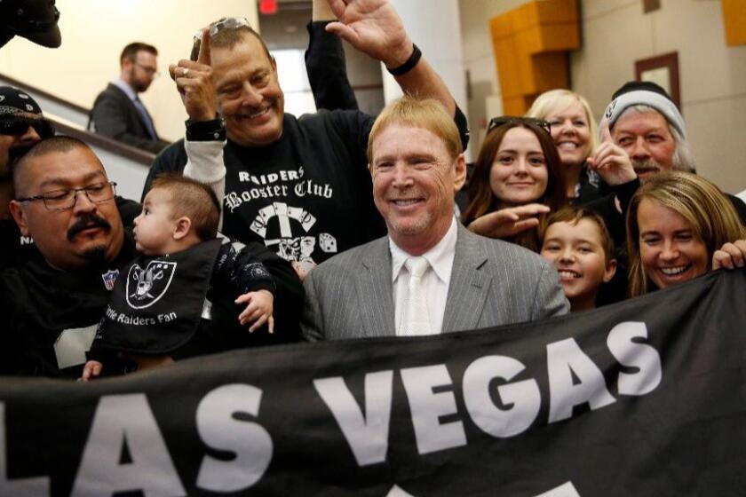 Oakland Raiders owner Mark Davis, center, meets with fans after speaking at a meeting of the Southern Nevada Tourism Infrastructure Committee in Las Vegas in April 2016.
