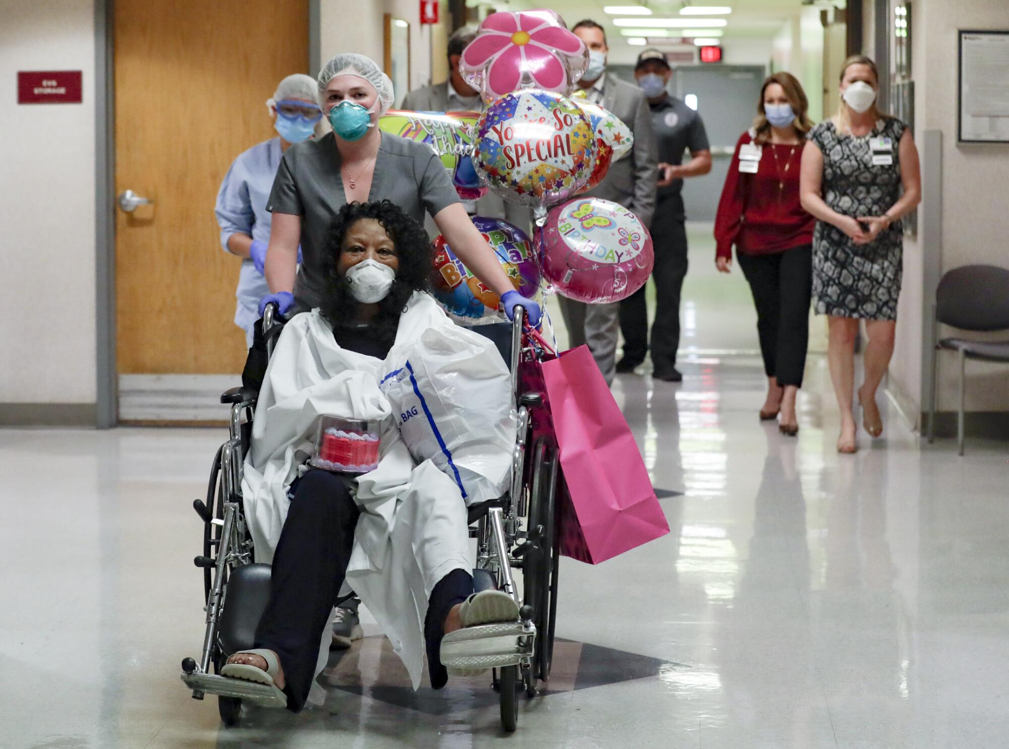 Janice Brown recovered from coronavirus symptoms leaves the Desert Valley Medical Group hospital.