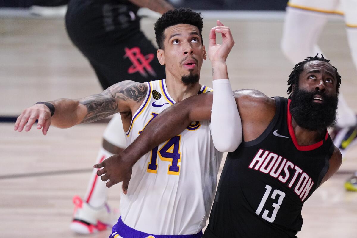 Lakers guard Danny Green battles Houston's James Harden for rebounding position during Game 5 on Sept. 12, 2020.