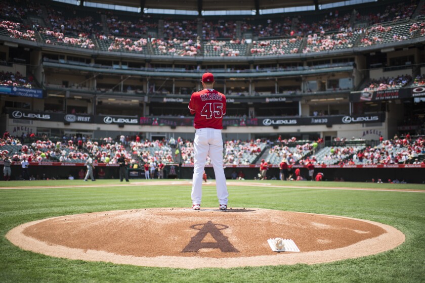 Tyler Skaggs prepares to pitch while warming up for the Angels before a game against the Red Sox on July 31, 2016.