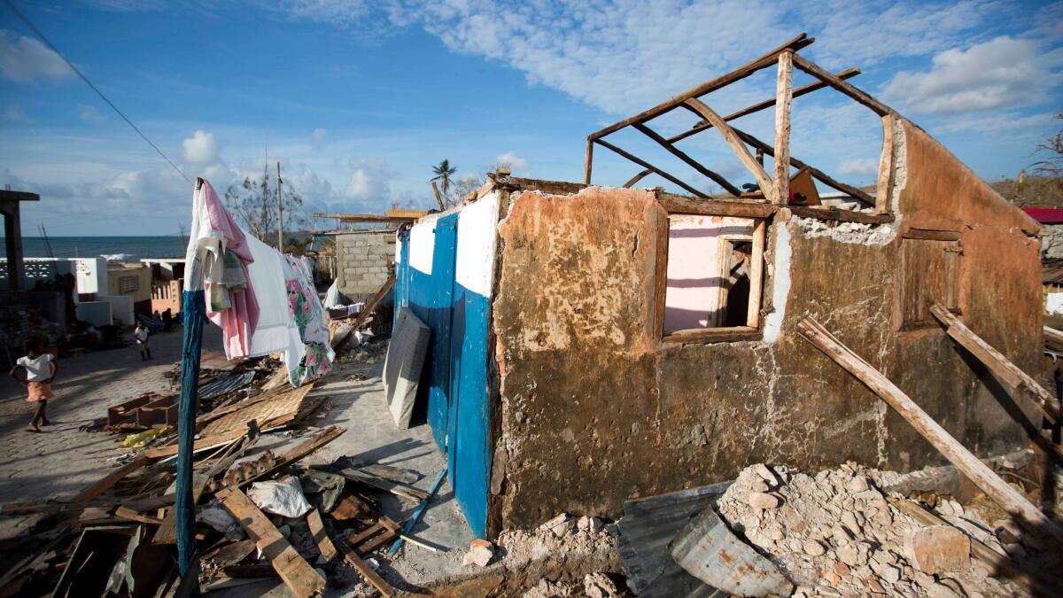 A house nearly destroyed by Hurricane Matthew remains occupied in Dame-Marie, Haiti, on Oct. 10, 2016.