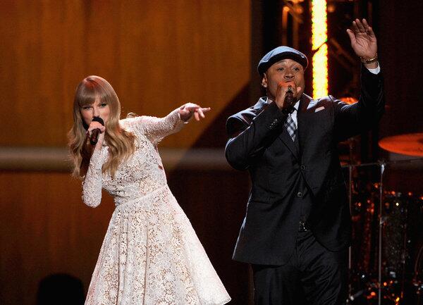 The show kicked off with hosts Taylor Swift and LL Cool J switching music genres. Swift beatboxed while LL Cool J sang out "Honky-tonk, here I come."