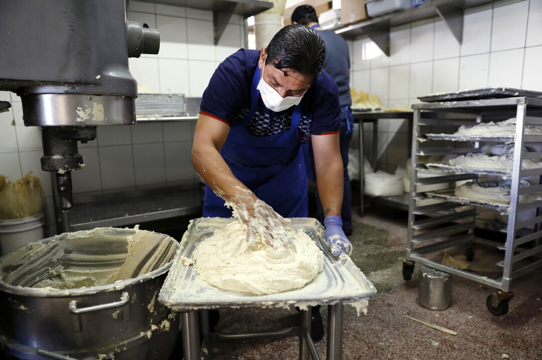 Hilario Rosales makes tamales at Tamales Liliana's in Boyle Heights.