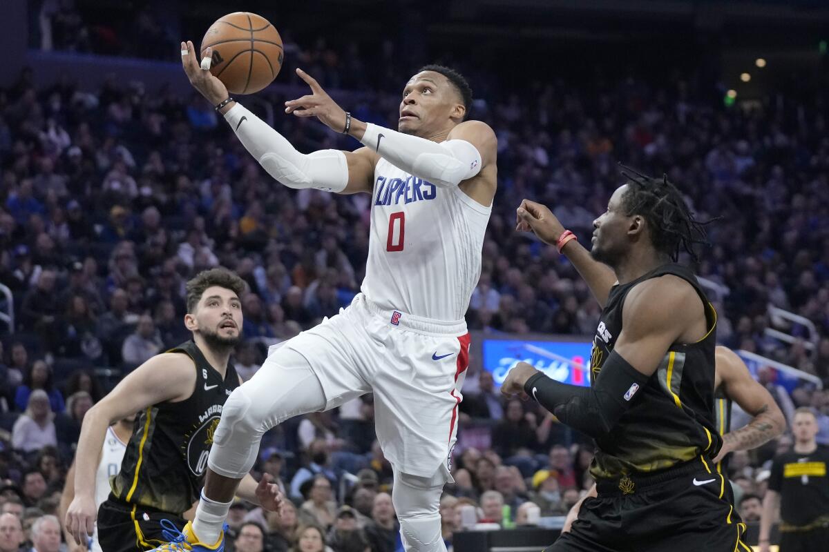 Clippers guard Russell Westbrook puts up a shot against the Golden State Warriors.