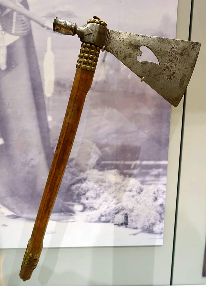 This undated photo shows a tomahawk once owned by Chief Standing Bear, a pioneering Native American civil rights leader, which will be returning to his Nebraska tribe after decades in a museum at Harvard University in Cambridge, Mass. The university's Peabody Museum of Archaeology & Ethnology says it's been working with members of the Ponca Tribe in Nebraska and Oklahoma to repatriate the artifact. (Harvard Crimson via AP)