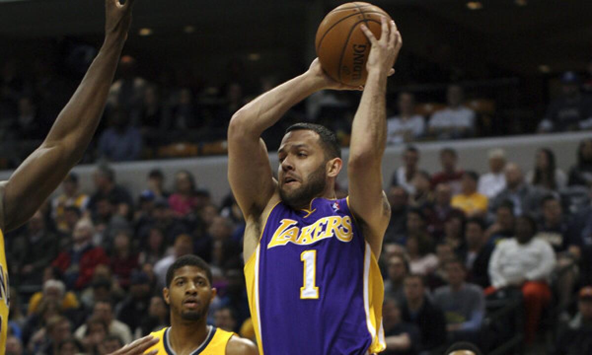 Lakers guard Jordan Farmar looks to pass in a game against the Indiana Pacers.