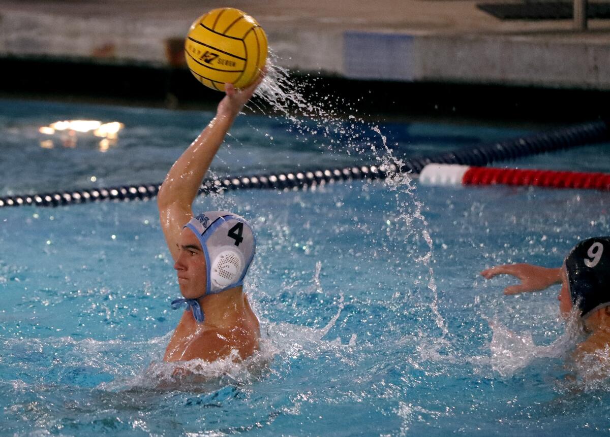 Corona del Mar's Dylan Hamm (4) makes a pass.