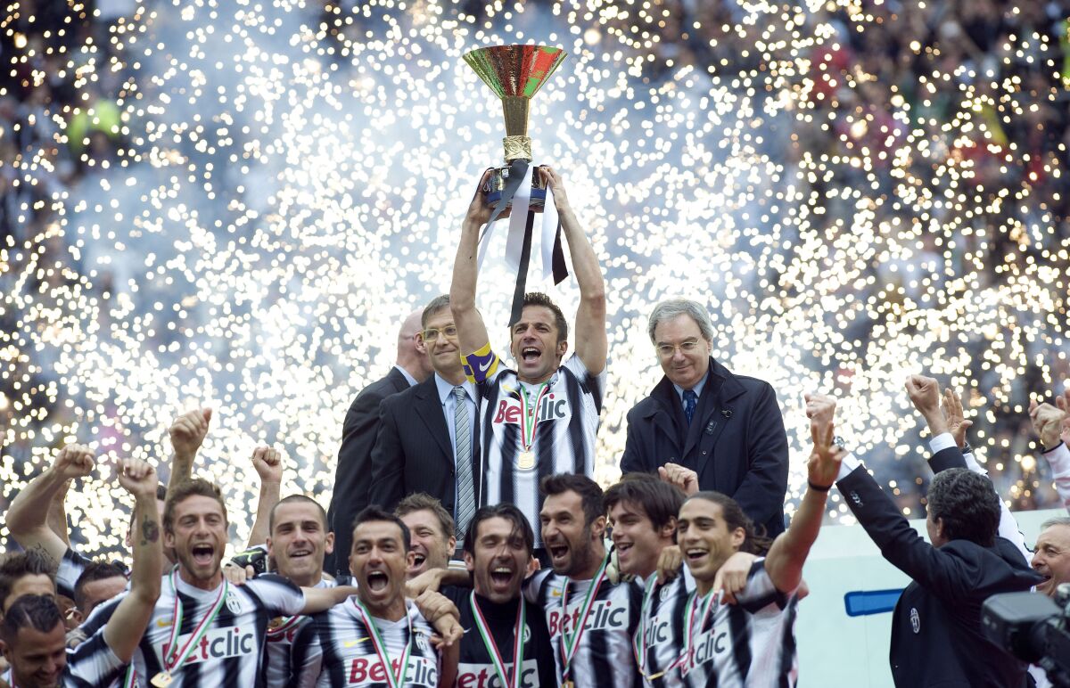 Juventus captain Alessandro Del Piero holds a trophy after his team beat Atalanta at Juventus Stadium on May 13, 2012. 