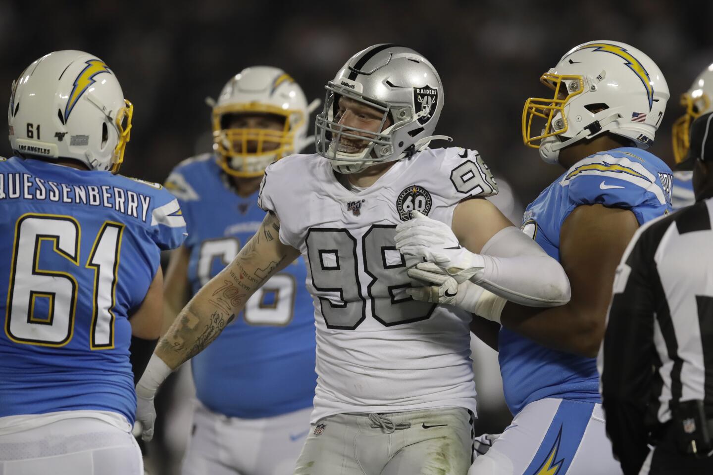 Raiders defensive end Maxx Crosby (98) reacts after a play during a game against the Chargers on Nov. 7 at RingCentral Coliseum.