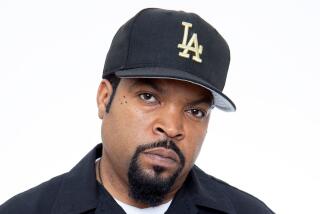 FILE - In this Sunday, August 2, 2015 file photo, Ice Cube poses for a portrait in promotion of the new film "Straight Outta Compton," at the Four Seasons Hotel in Los Angeles.