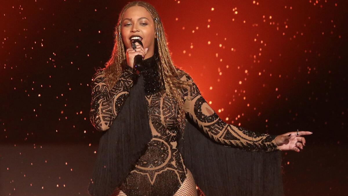 Madame Tussauds reports that its wax Beyoncé figure is back on display after adjustments to "the styling and lighting of her figure." Here, the real Beyoncé performs at the BET Awards in 2016.