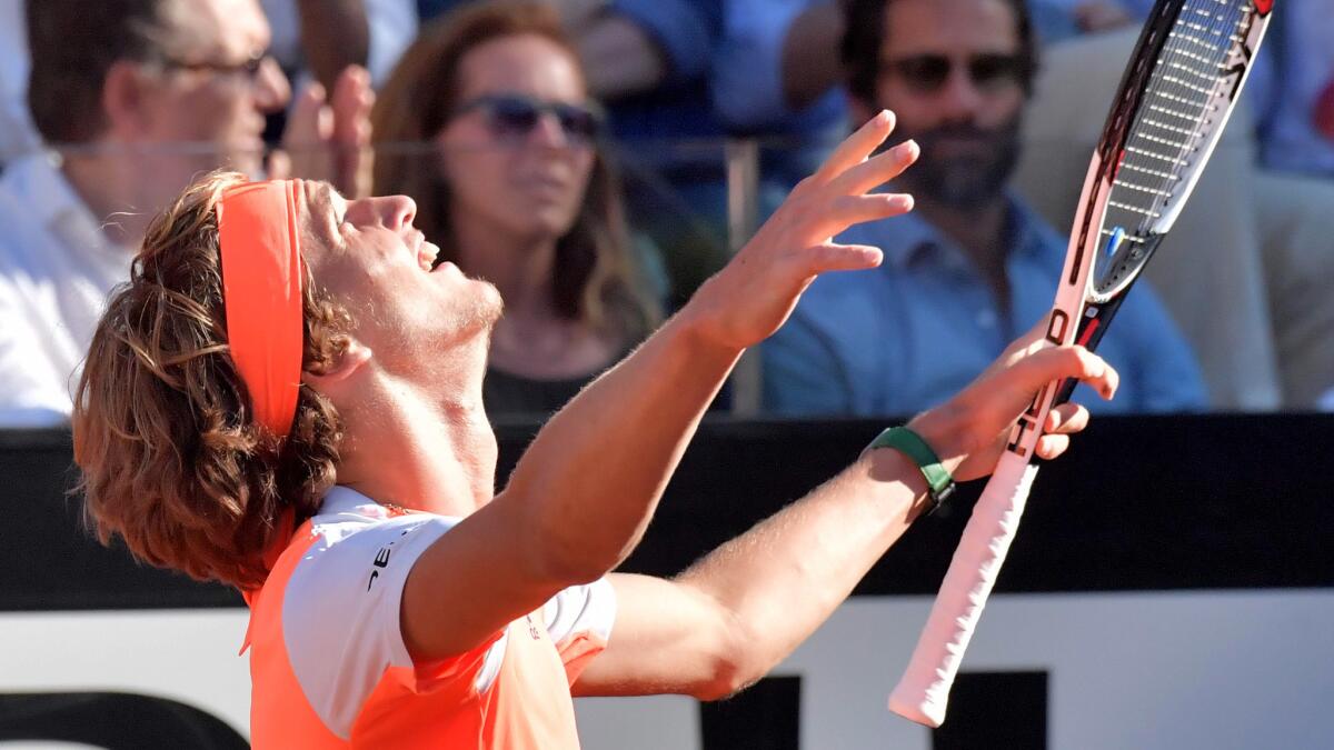Alexander Zverev celebrates after defeating Novak Djokovic in straight sets to win the Italian Open on Sunday.
