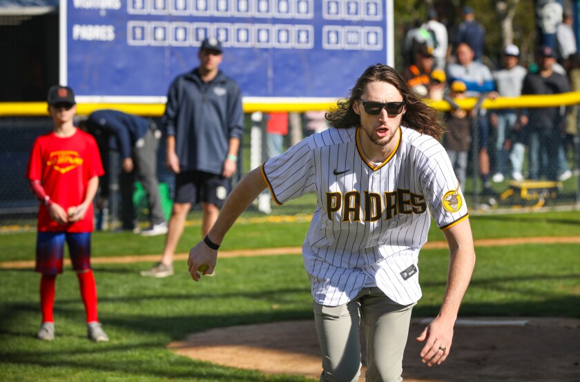Padres pitcher Matt Strahm pitches to kids during Padres FanFest 2020 in January at Petco Park.