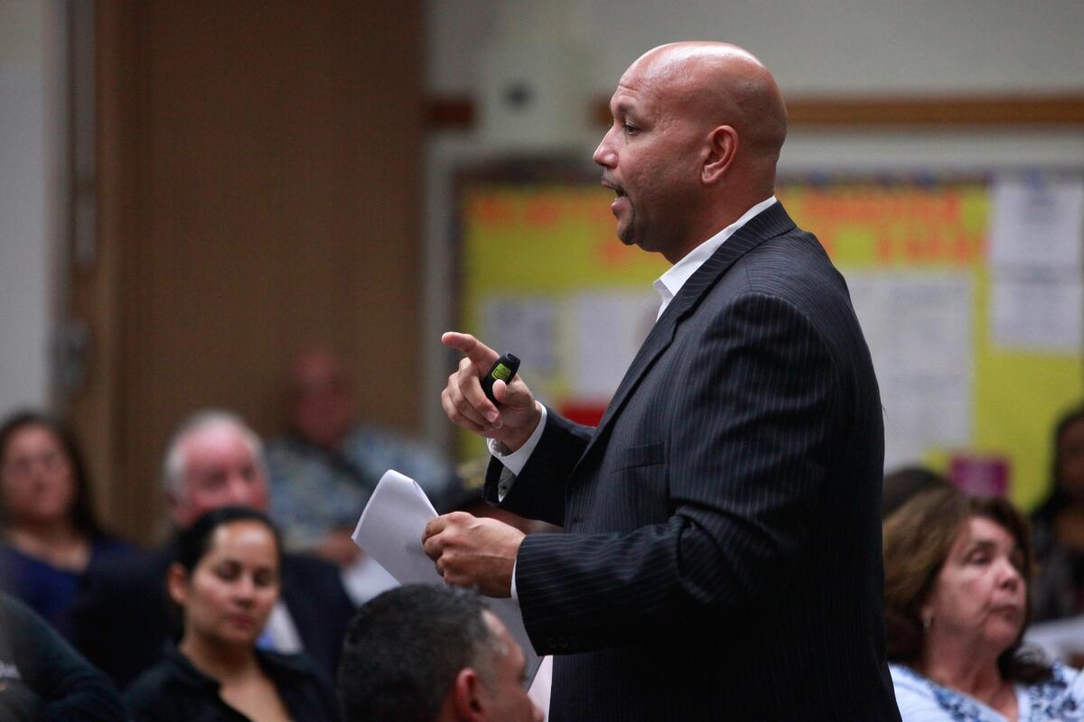 Lamont Jackson leads a community meeting in 2015