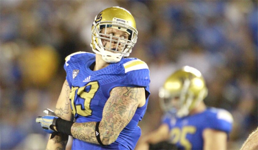UCLA defensive end Cassius Marsh saw limited playing time in the Bruins' loss to Stanford, 24-10. Asked why, Coach Jim Mora said the reason "should stay in-house."