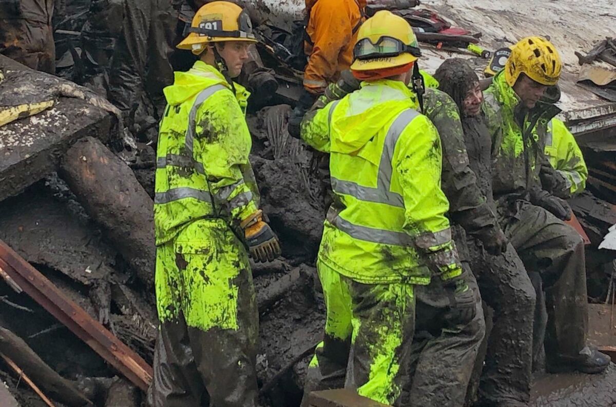 Firefighters successfully rescued a 14 yr old girl after she was trapped for hours inside a destroyed home in Montecito on Jan. 9. (Mike Eliason / Santa Barbara County Fire Department)