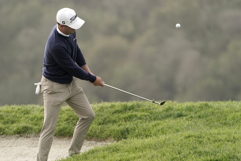 Justin Thomas chips onto the third green during a practice round of the U.S. Open Golf Championship, Wednesday, June 16, 2021, at Torrey Pines Golf Course in San Diego. (AP Photo/Jae C. Hong)
