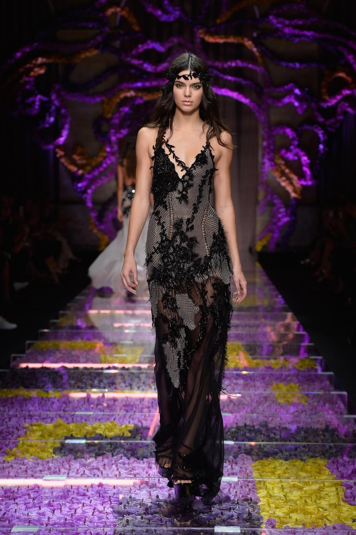 Kendall Jenner walks the runway during the Atelier Versace show.