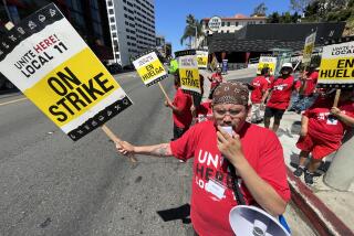 WEST HOLLYWOOD, CA JULY 20, 2023 -- A third wave of rolling strikes from hotel workers outside the Andaz West Hollywood on Thursday July 20, 2023.Workers are picketing for higher wages and better benefits and working conditions. (Wally Skalij / Los Angeles Times)